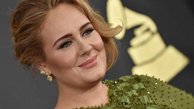 Adele reportedly tells fan she lost “something like 100 pounds”