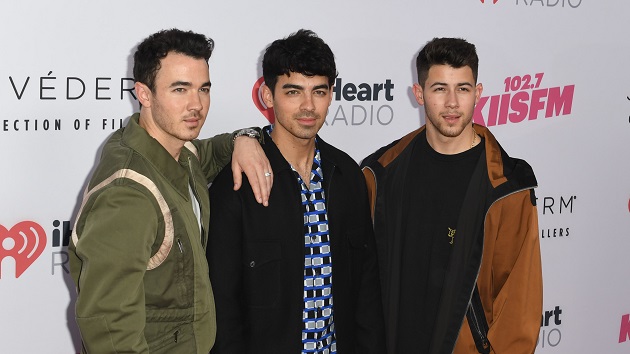 Nick and Joe Jonas channel their inner Kardashians to recreate the infamous purse brawl